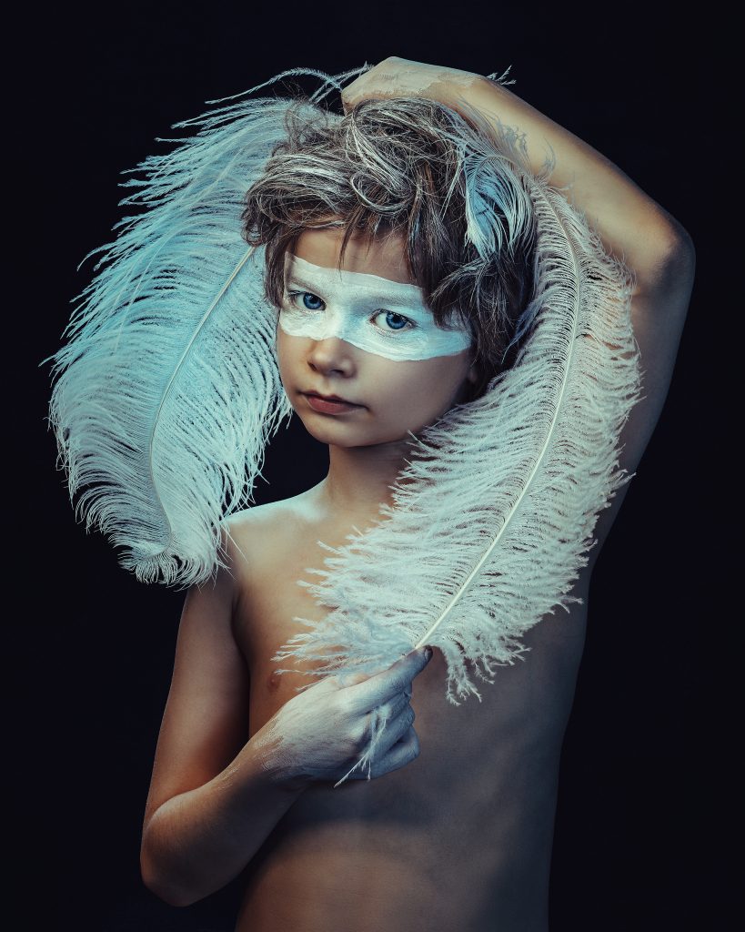 free spirit boy blue feathers