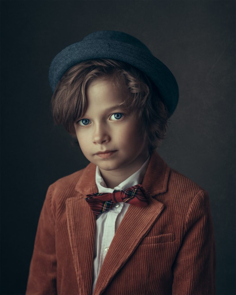 boy hat window light